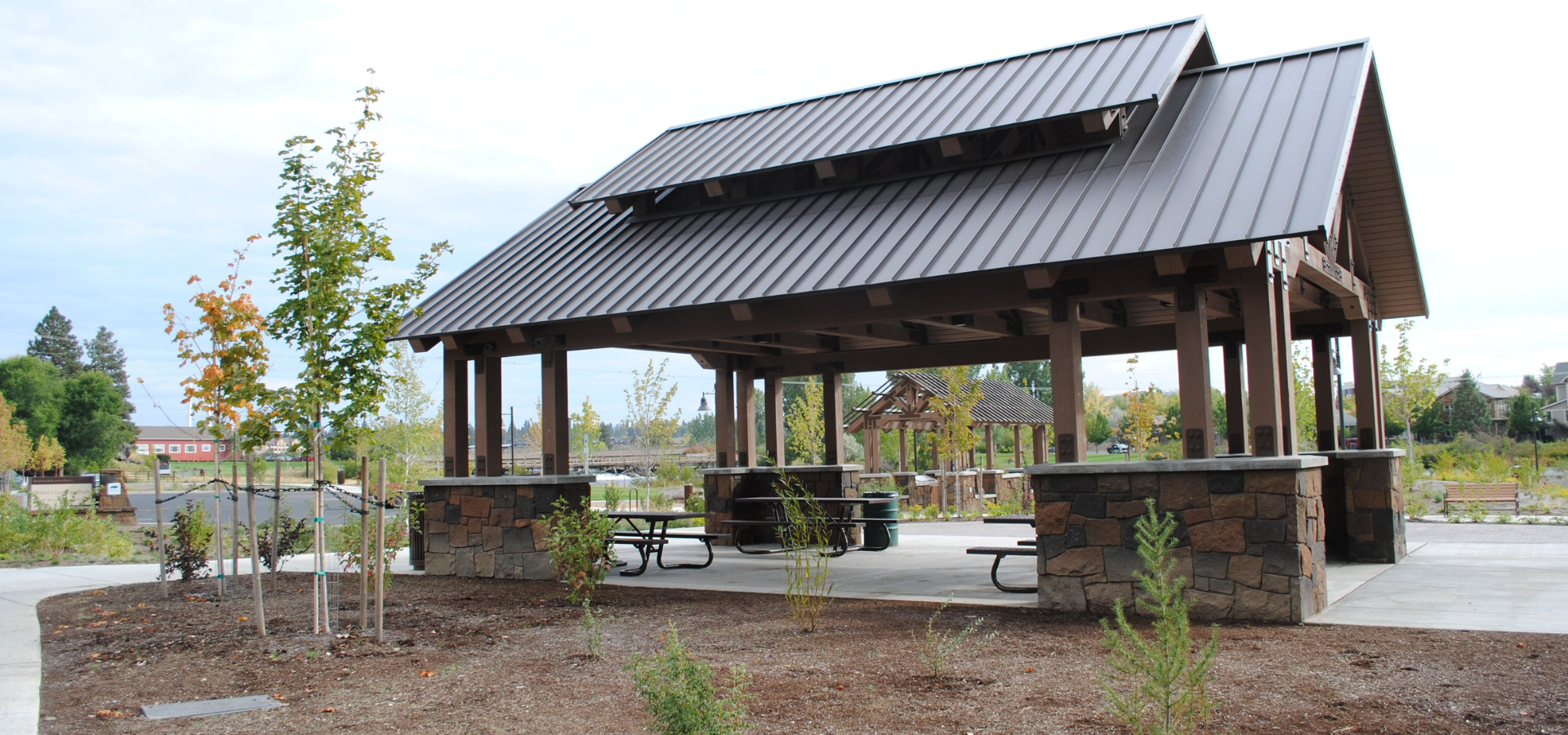 Miller's Landing picnic shelter with landscaping in the foreground