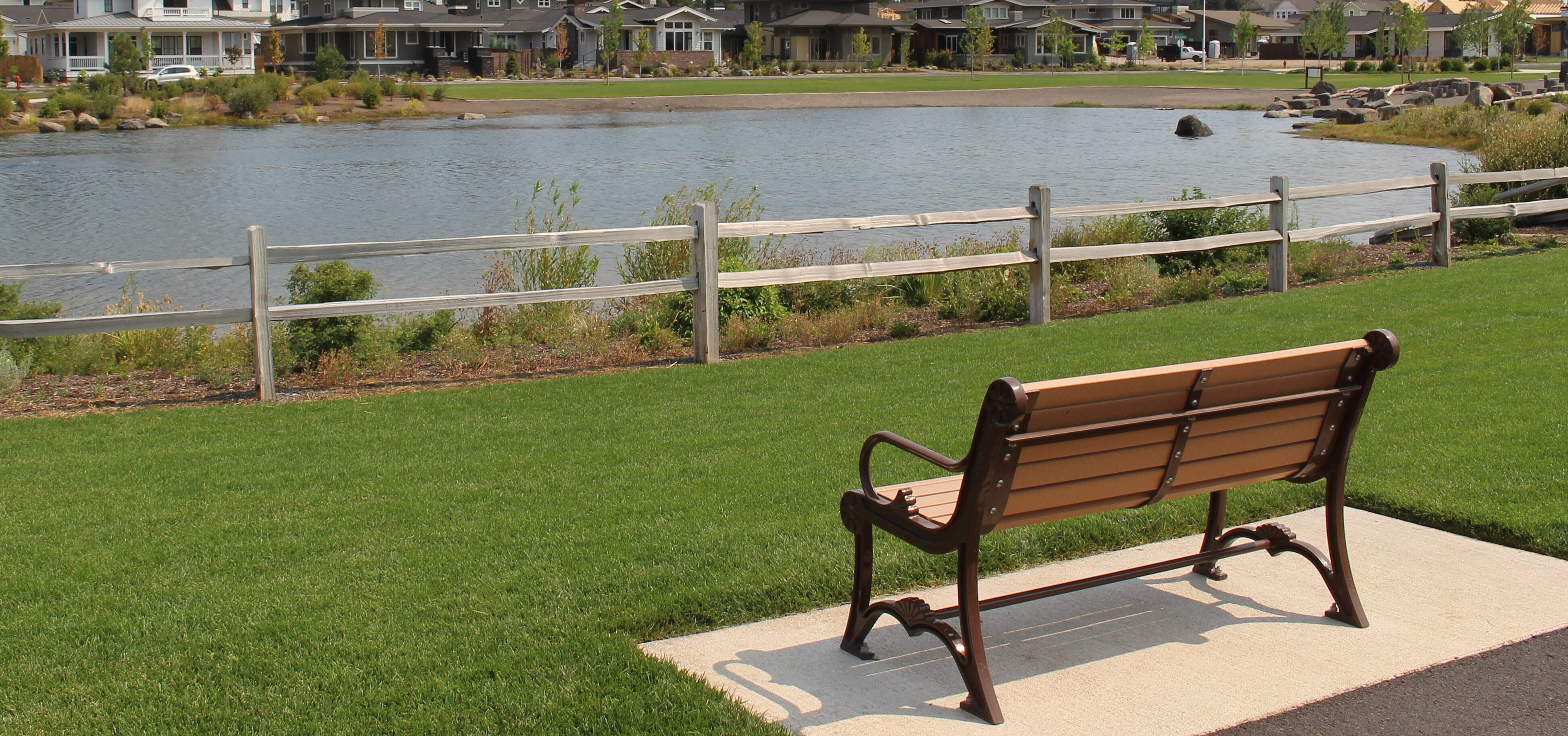 a bench overlooking a lake at discovery park