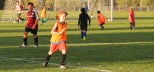 Boys playing soccer at Big Sky.