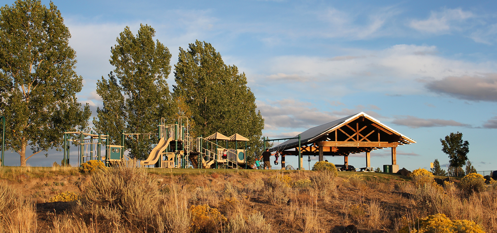 The playground and picnic shelter at Big Sky Park.