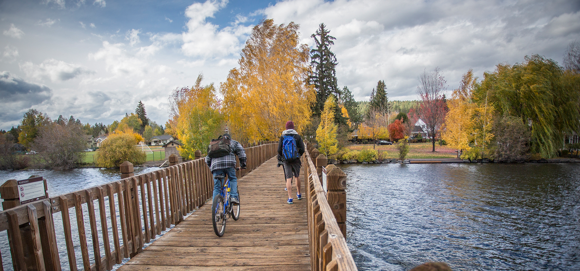 The pedestrian bridge at Drake Park in the fall.