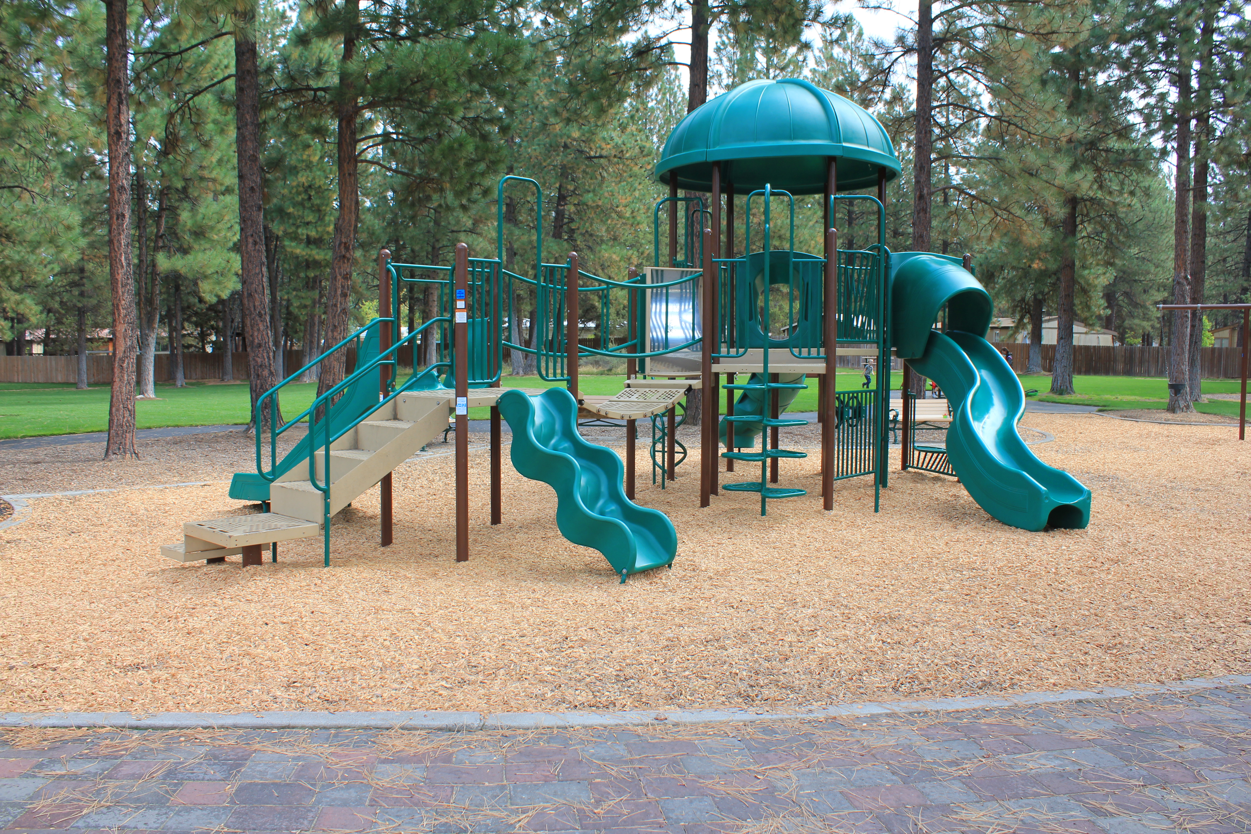 a play structure at alpenglow park