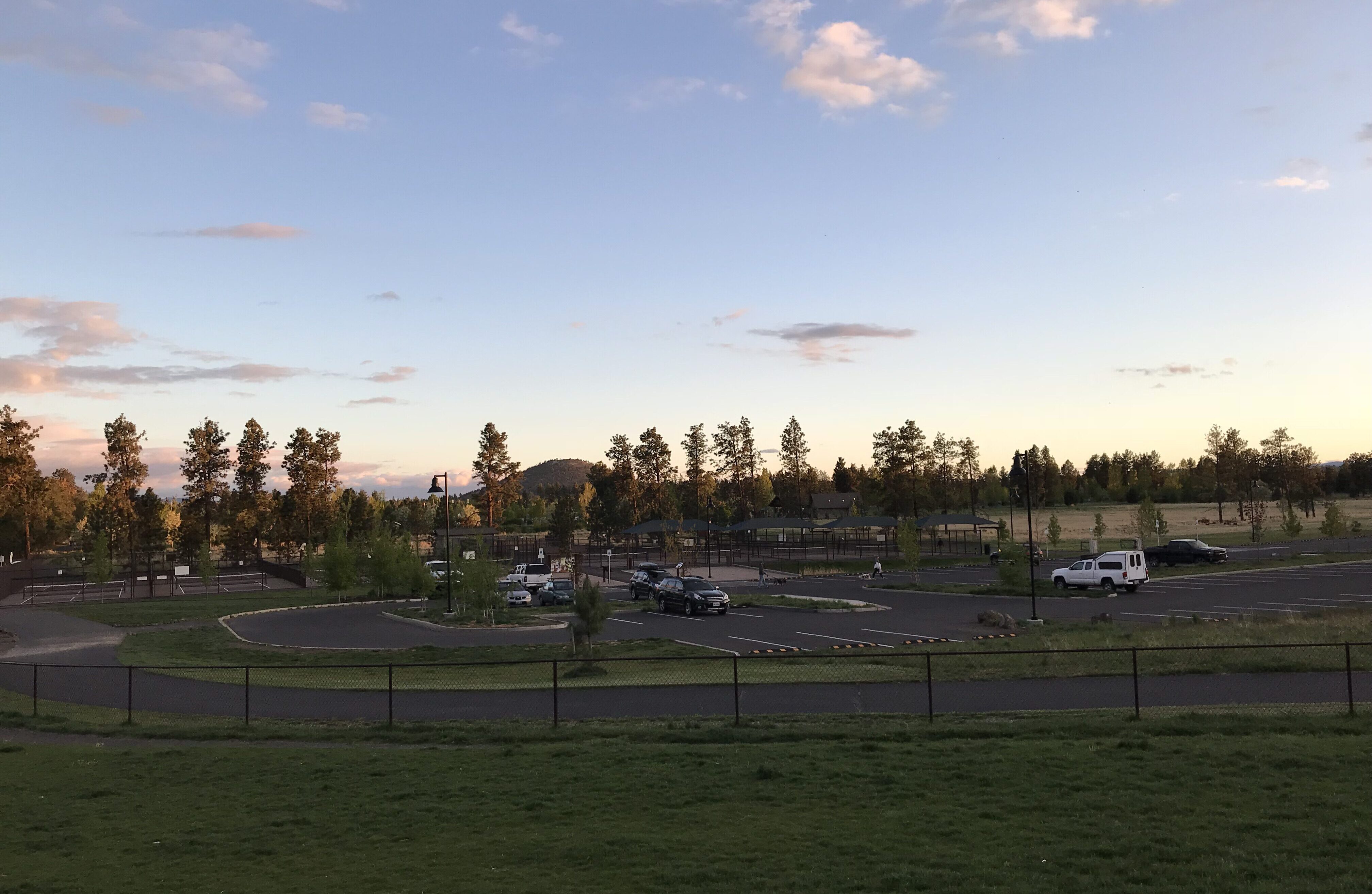 a parking lot and pickleball courts at pine nursery