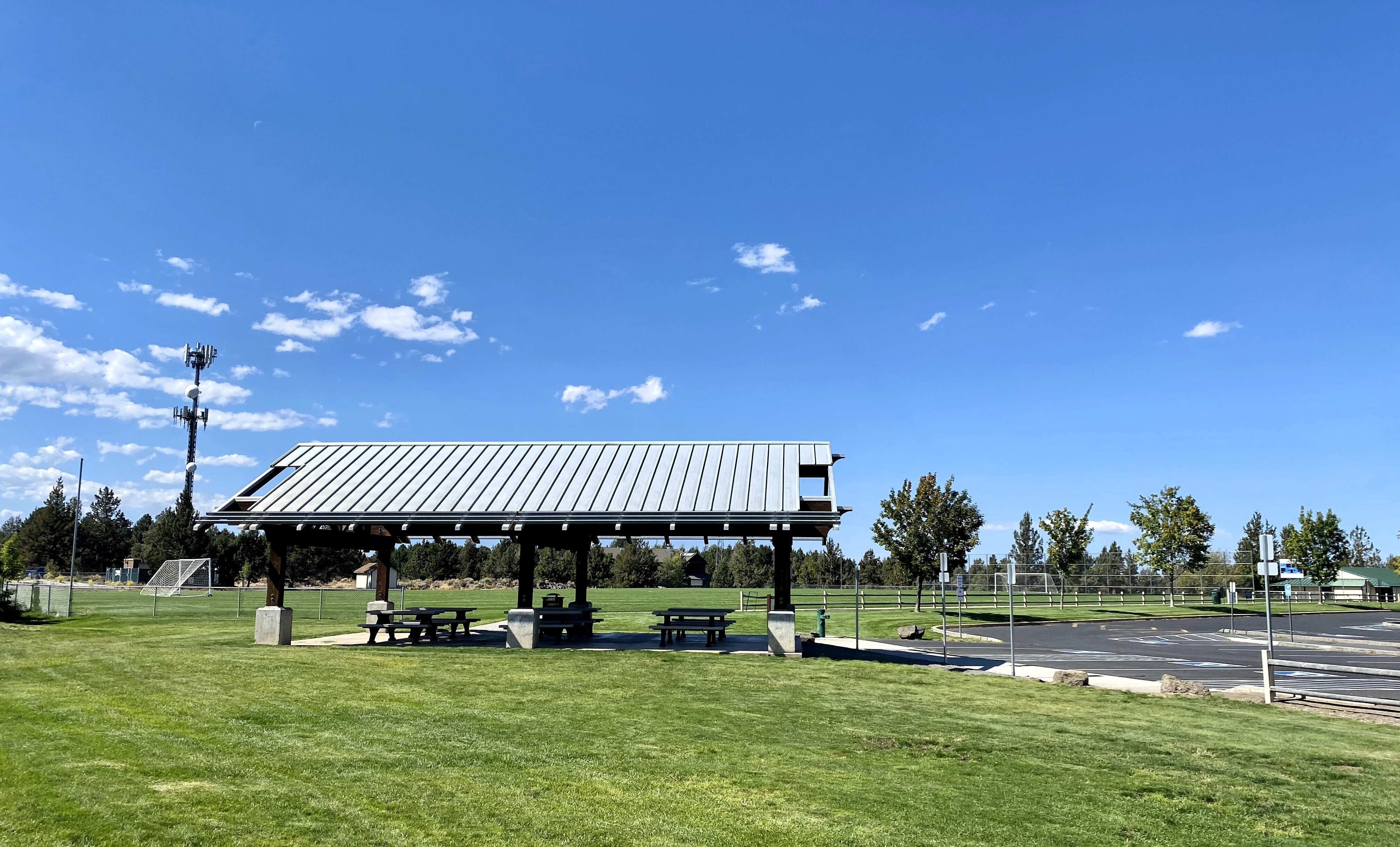 a picnic shelter at big sky park by the fields