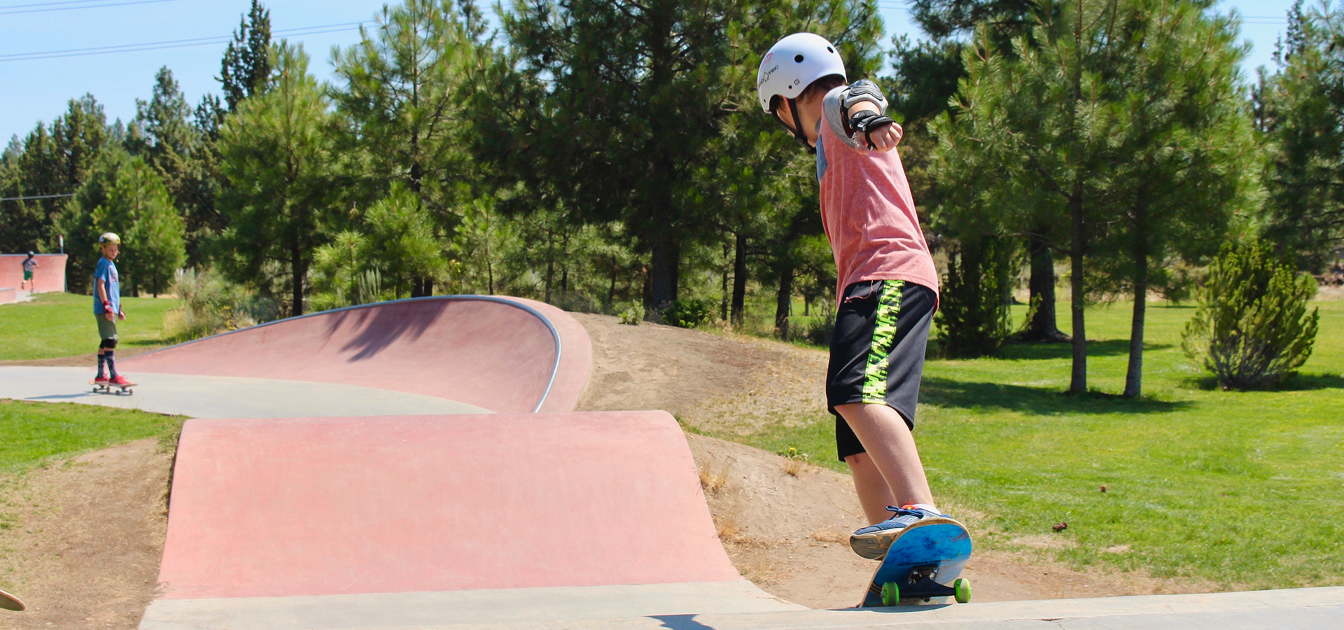 A boy doing a trick at the Ponderosa Skate Park.
