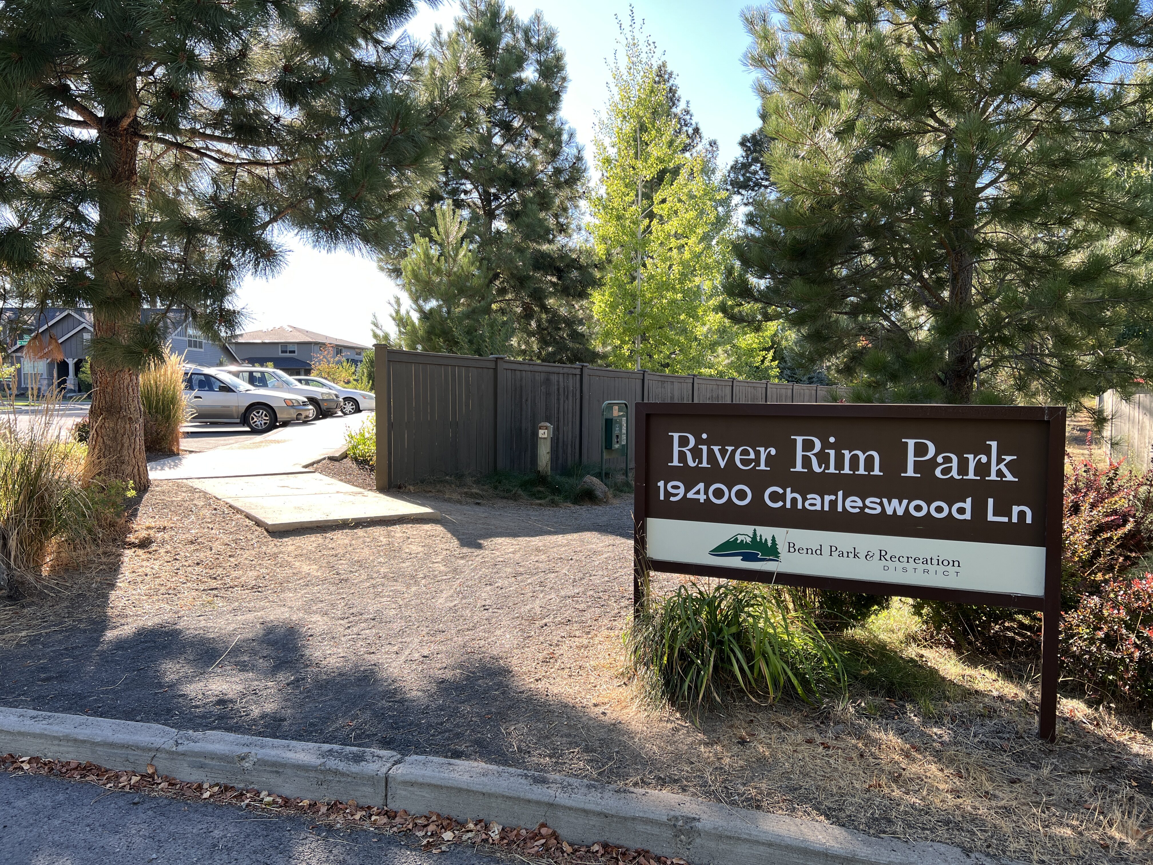 entry sign and path to river rim