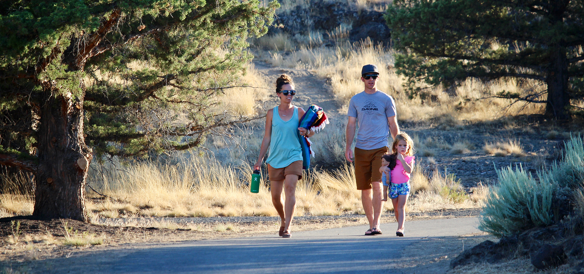a family walking together on a path at Rockridge Park