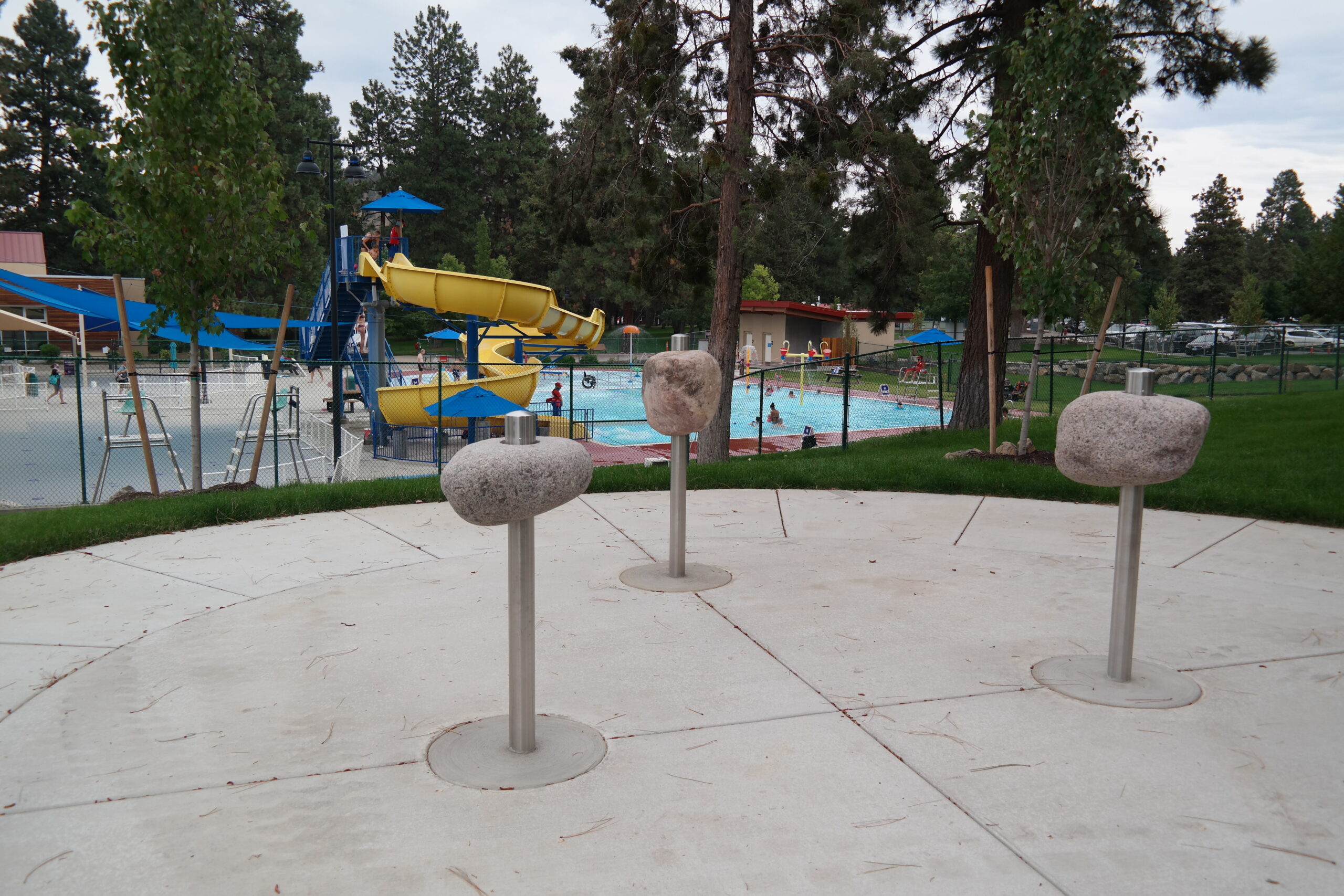 Juniper Park play area and swimming pool.