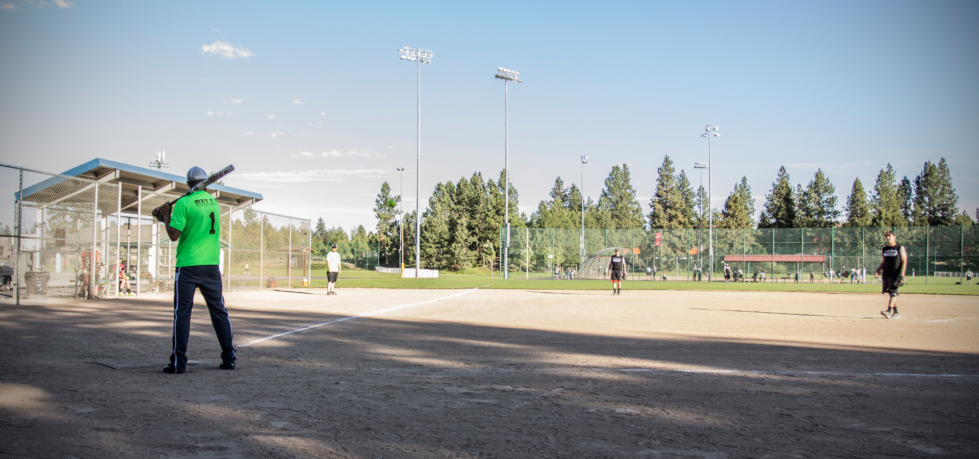 an adult softball game at Skyline Park.