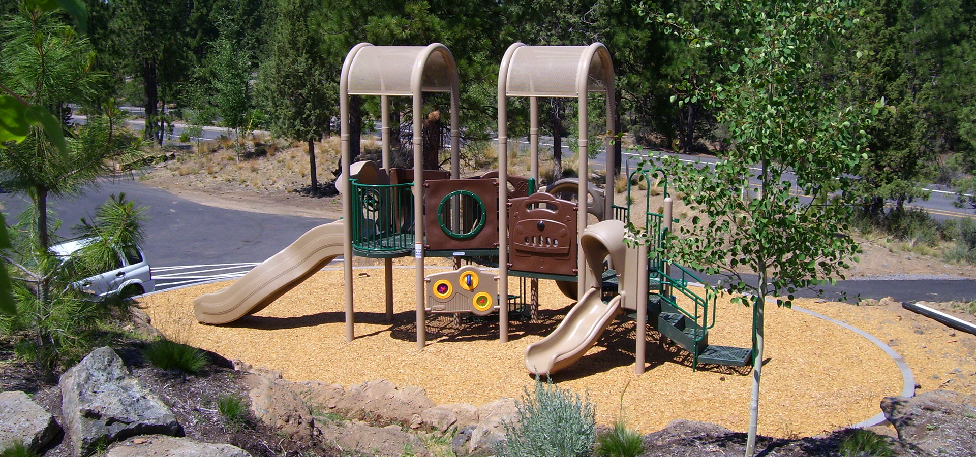 The play structure at Three Pines Park.