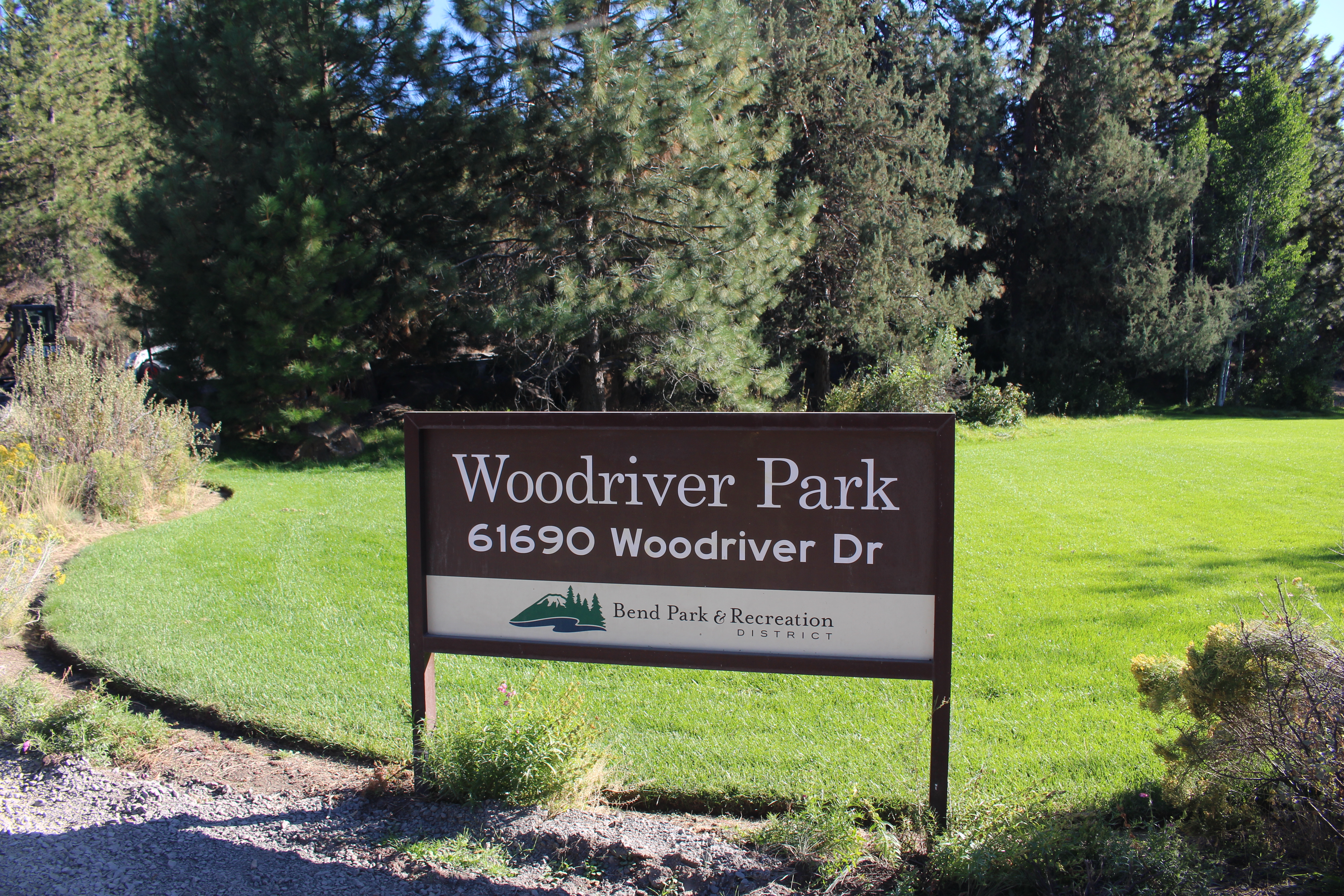 the woodriver park entry sign