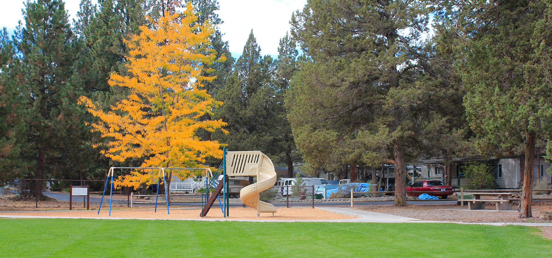 The playground at woodriver park in the fall.