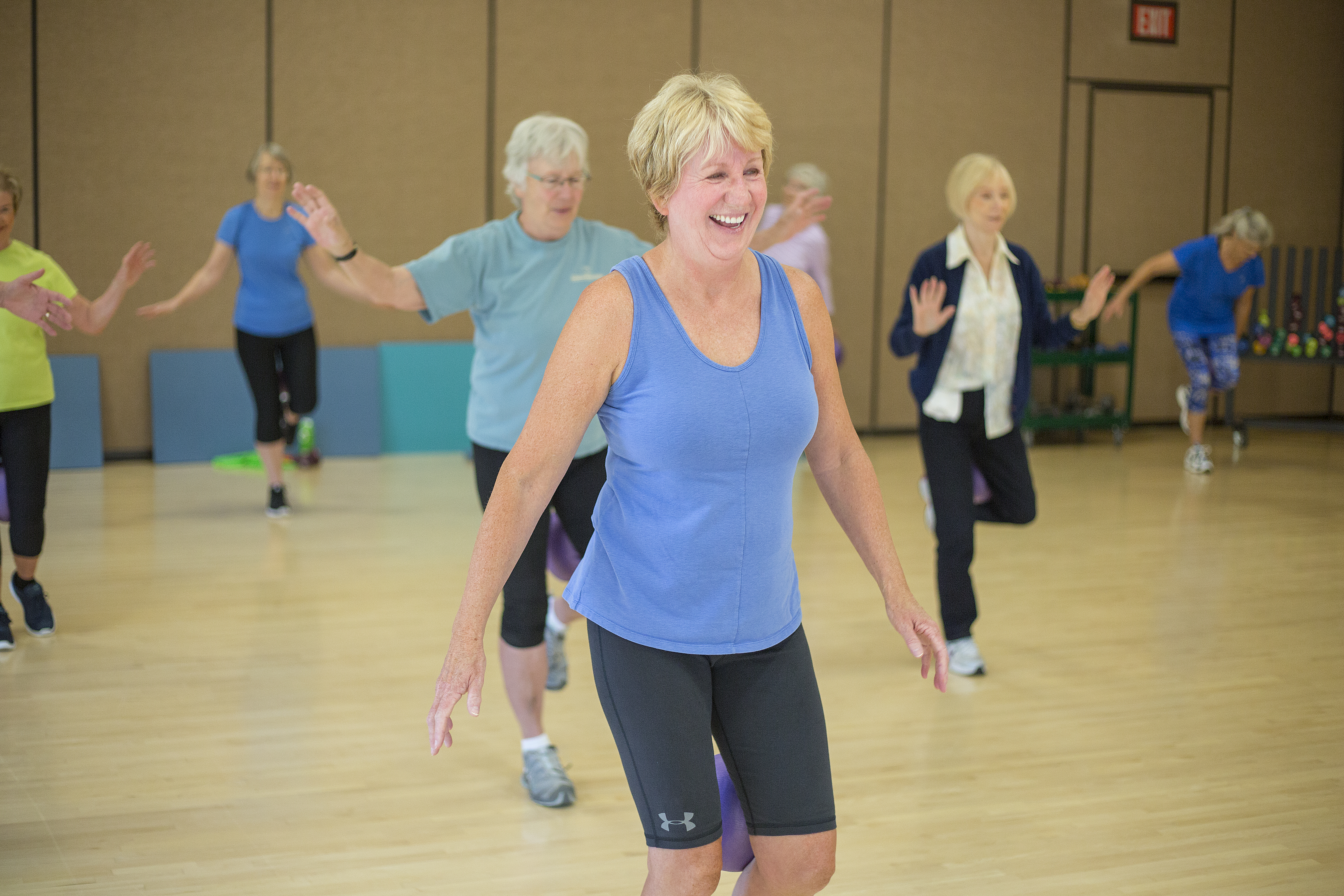 A group of older adults participate in a fitness group at Bend Senior Center
