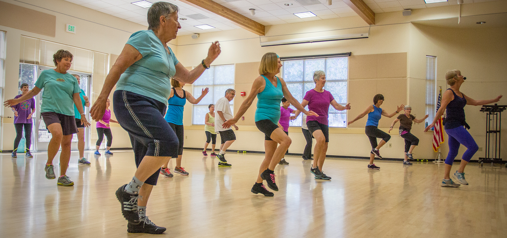 Older adults taking a Zumba class.