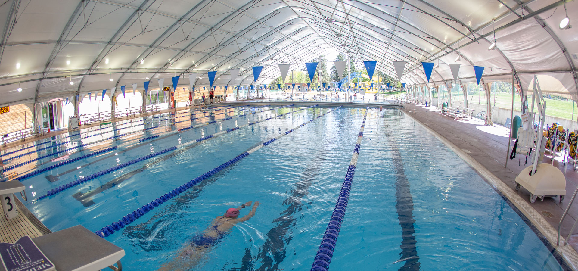 Fish eye photograph of the covered outdoor pool at Juniper