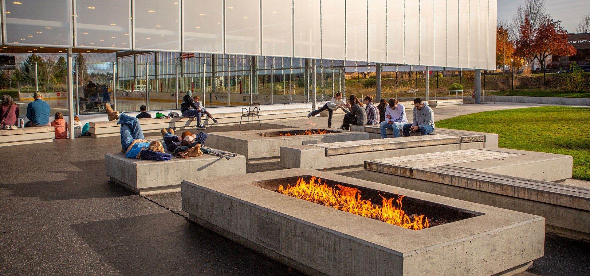 Photo of patrons at the Pavilion enjoying the outdoor space and fire pit.