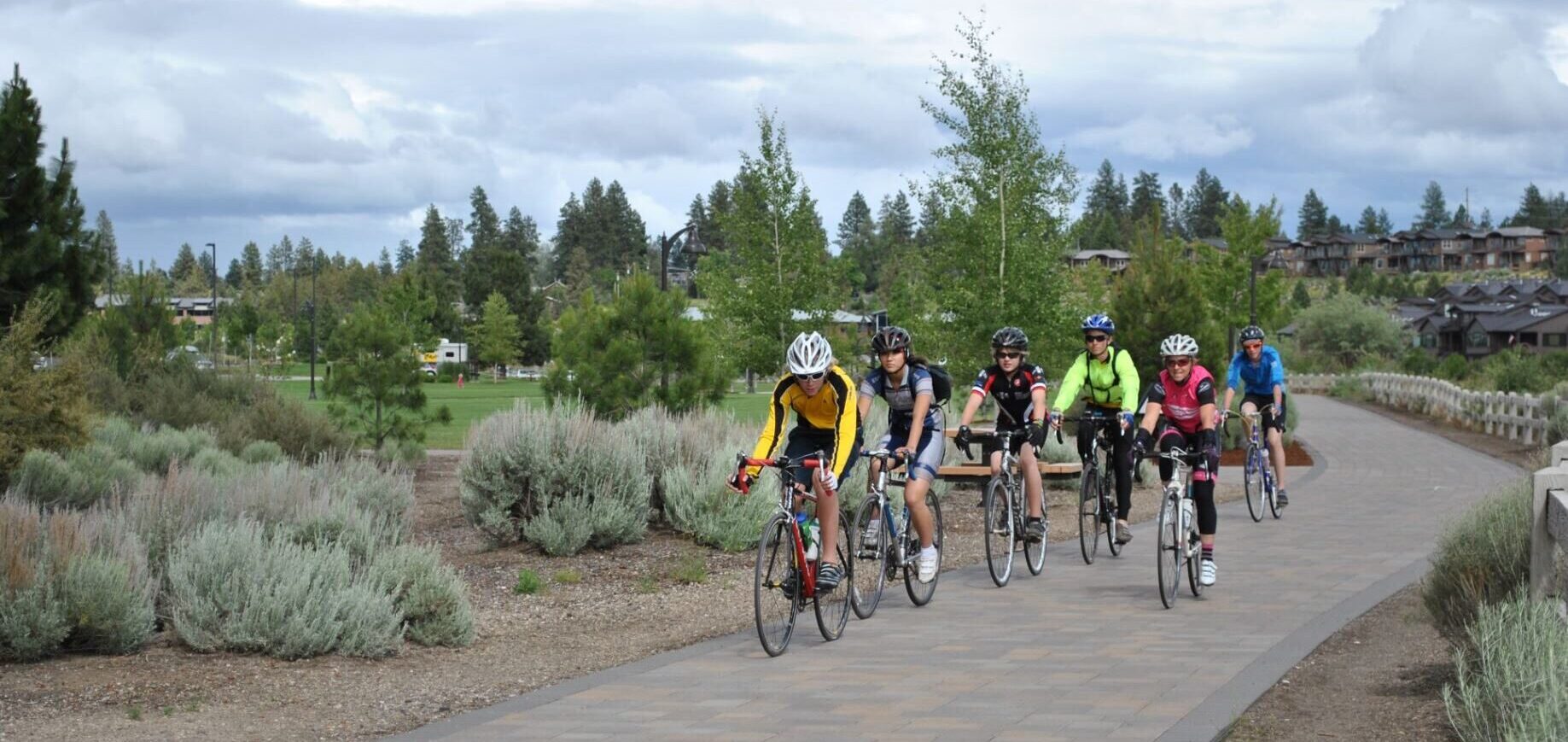 A group cycling in Riverbend Park