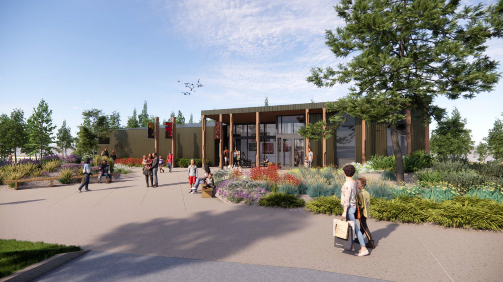 exterior rendering of the new Art Station with slat roof, porch, columns, large windows and a front court with people to arrive and linger