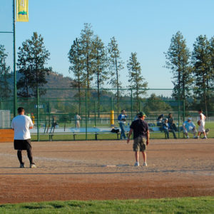 Men's softball game at Pine Nursery.