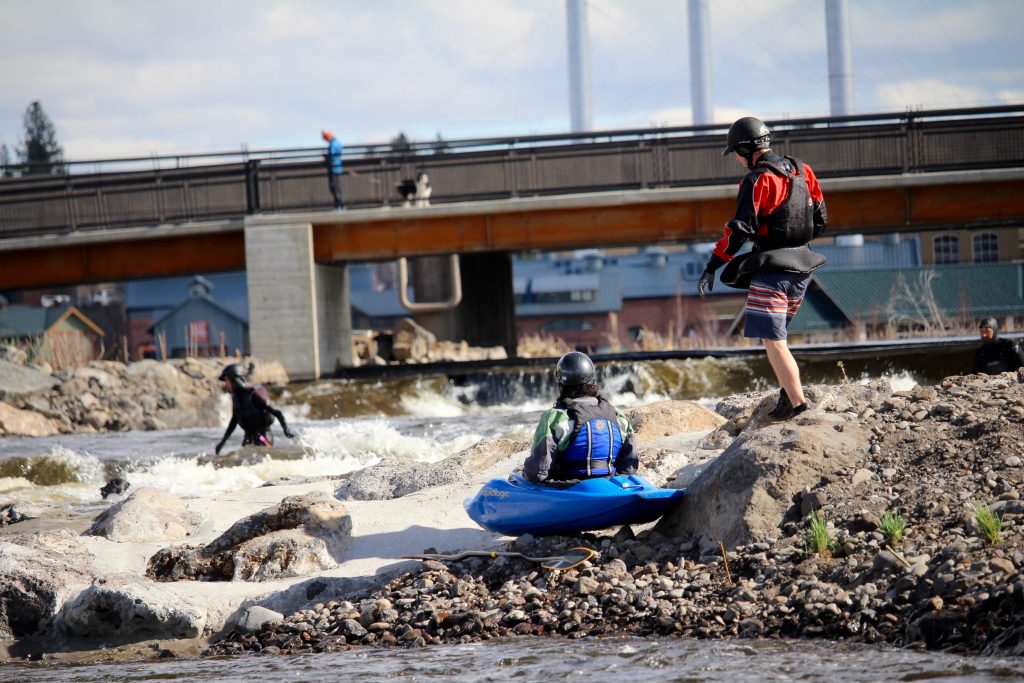 Bend Whitewater Park Kayakers near the Old Mill District
