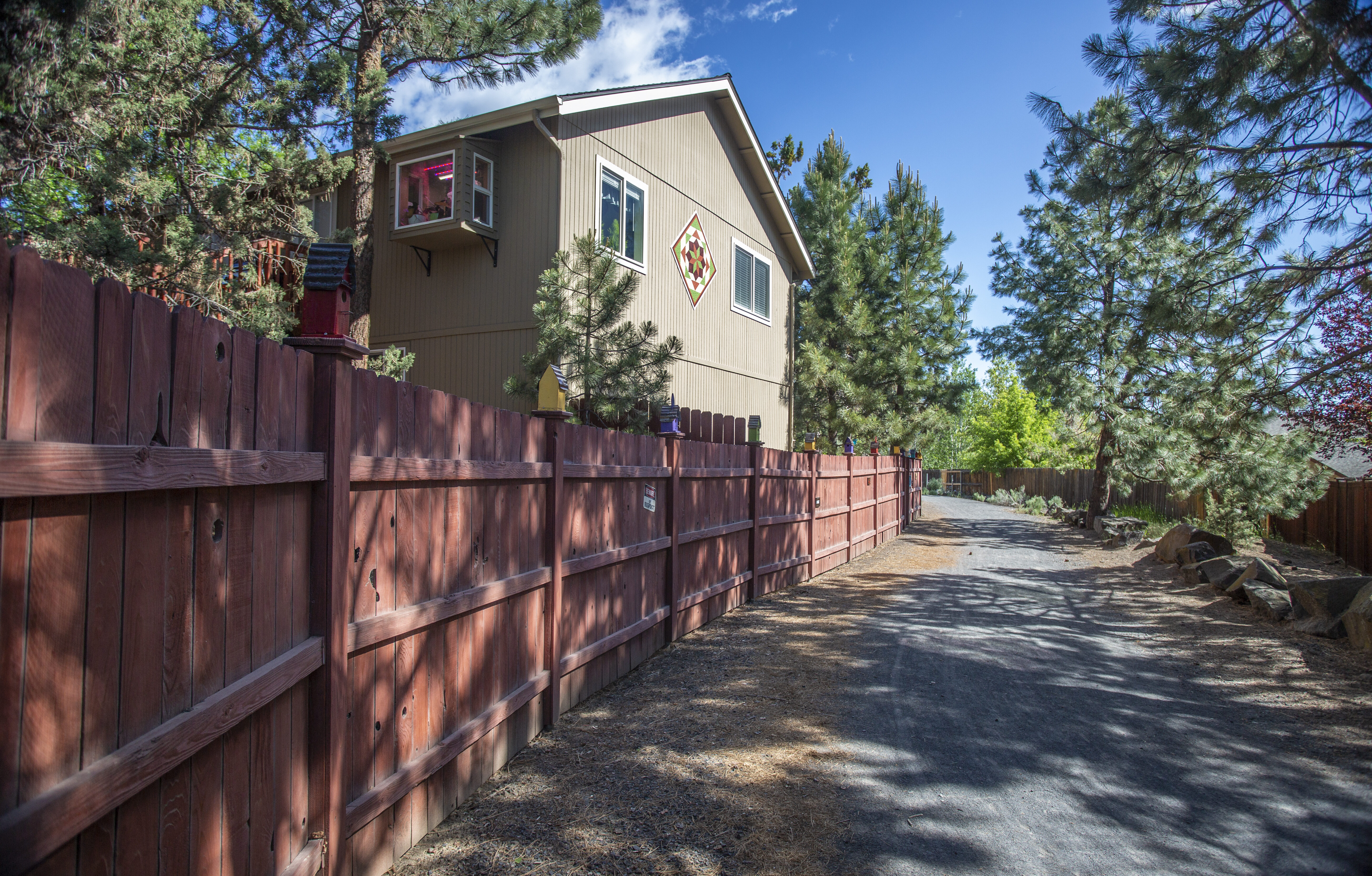 The Larkspur Trail running by neighborhood homes