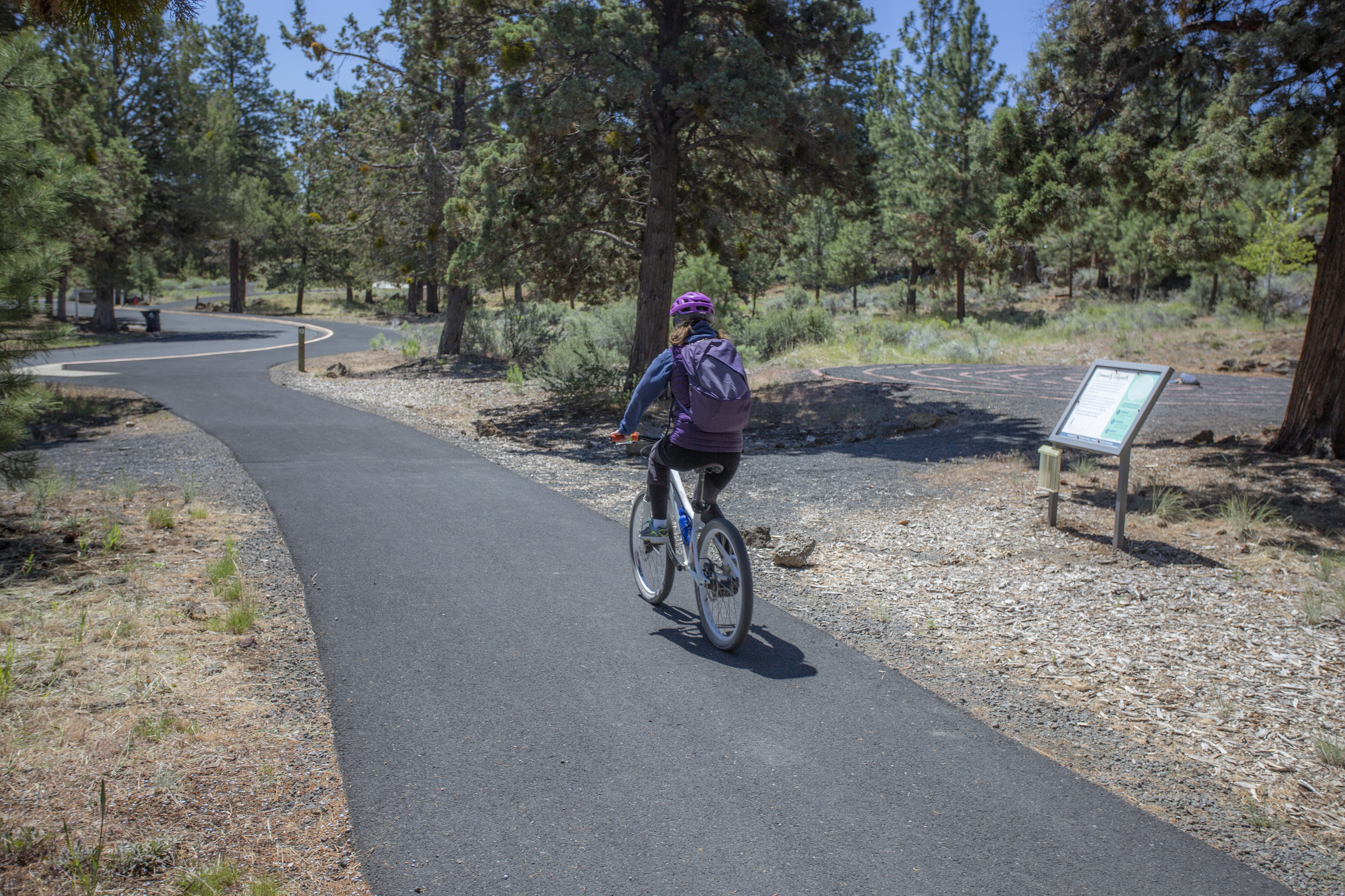 A trail user going by the labyrinth