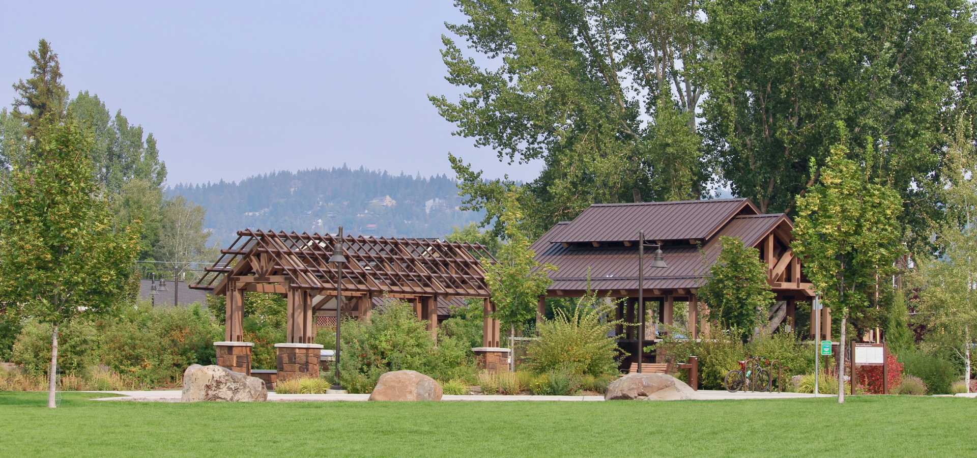 picnic shelters at Miller's Landing park with mountain in abckground