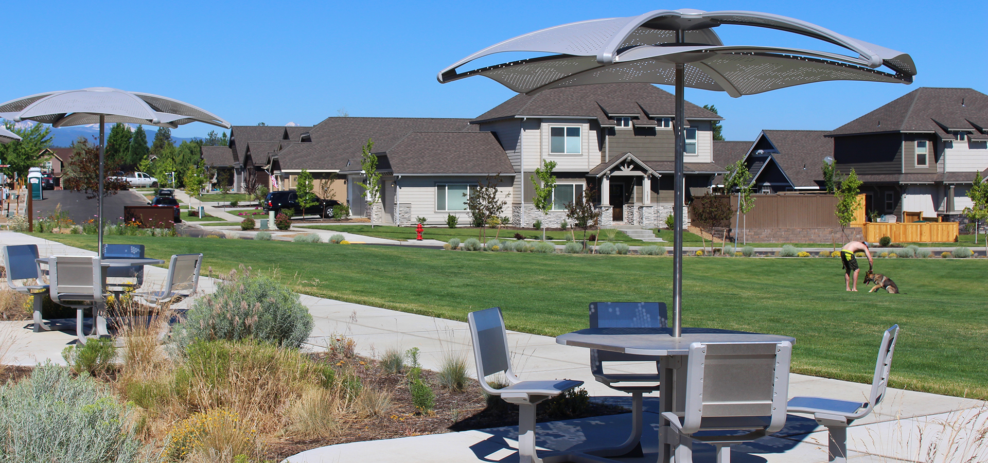 Tables and chairs with shade at Eagle Park.