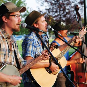 musicians playing at a free Let's Picnic event in Bend.