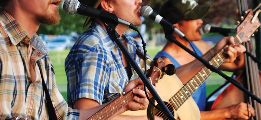 musicians playing at a free Let's Picnic event in Bend.