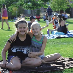 two teens at a free community event, Let's Picnic, in Bend.