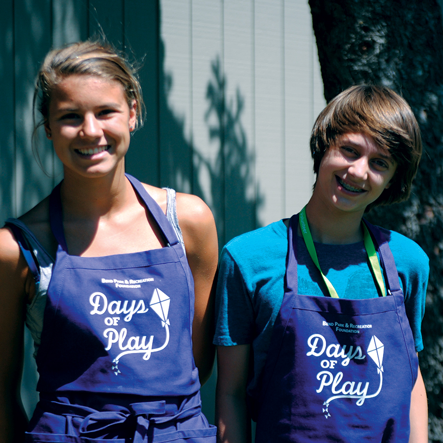 Image of teens volunteering at a free community event, Days of Play, in Bend.