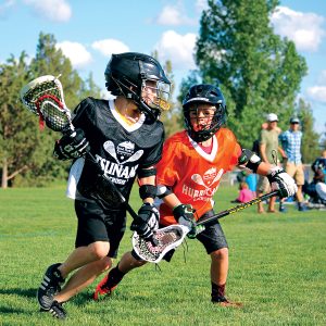 youth lacrosse players in Bend, Oregon.