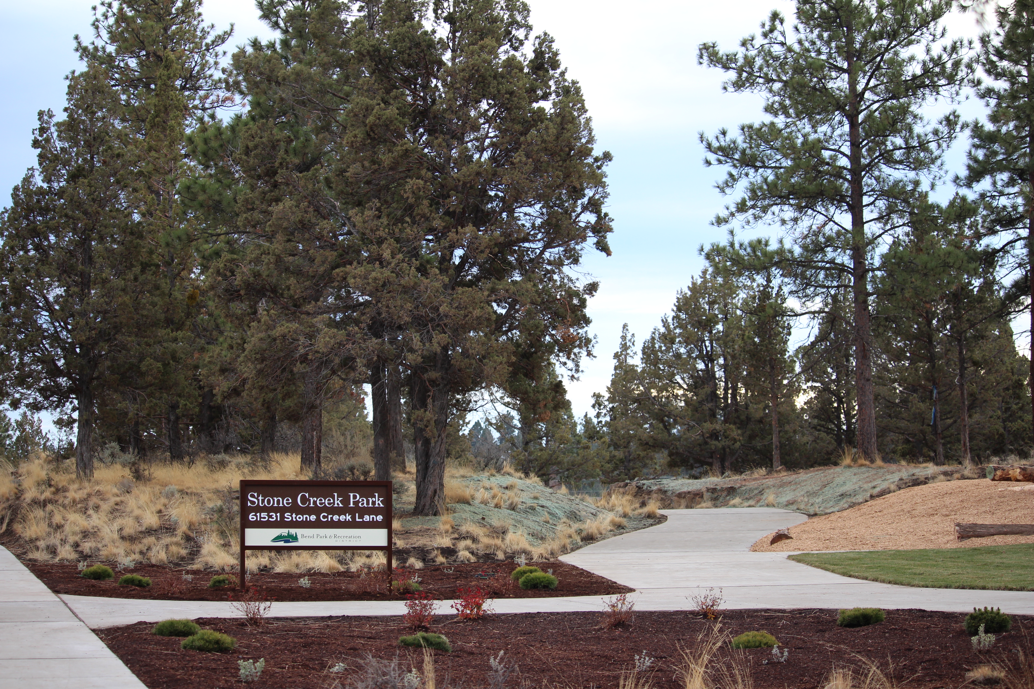 The park sign and entrance to Stone Creek Park
