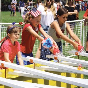 Image of kids at the July 4th Pet Parade and Old Fashion Festival in Downtown Bend, Oregon.