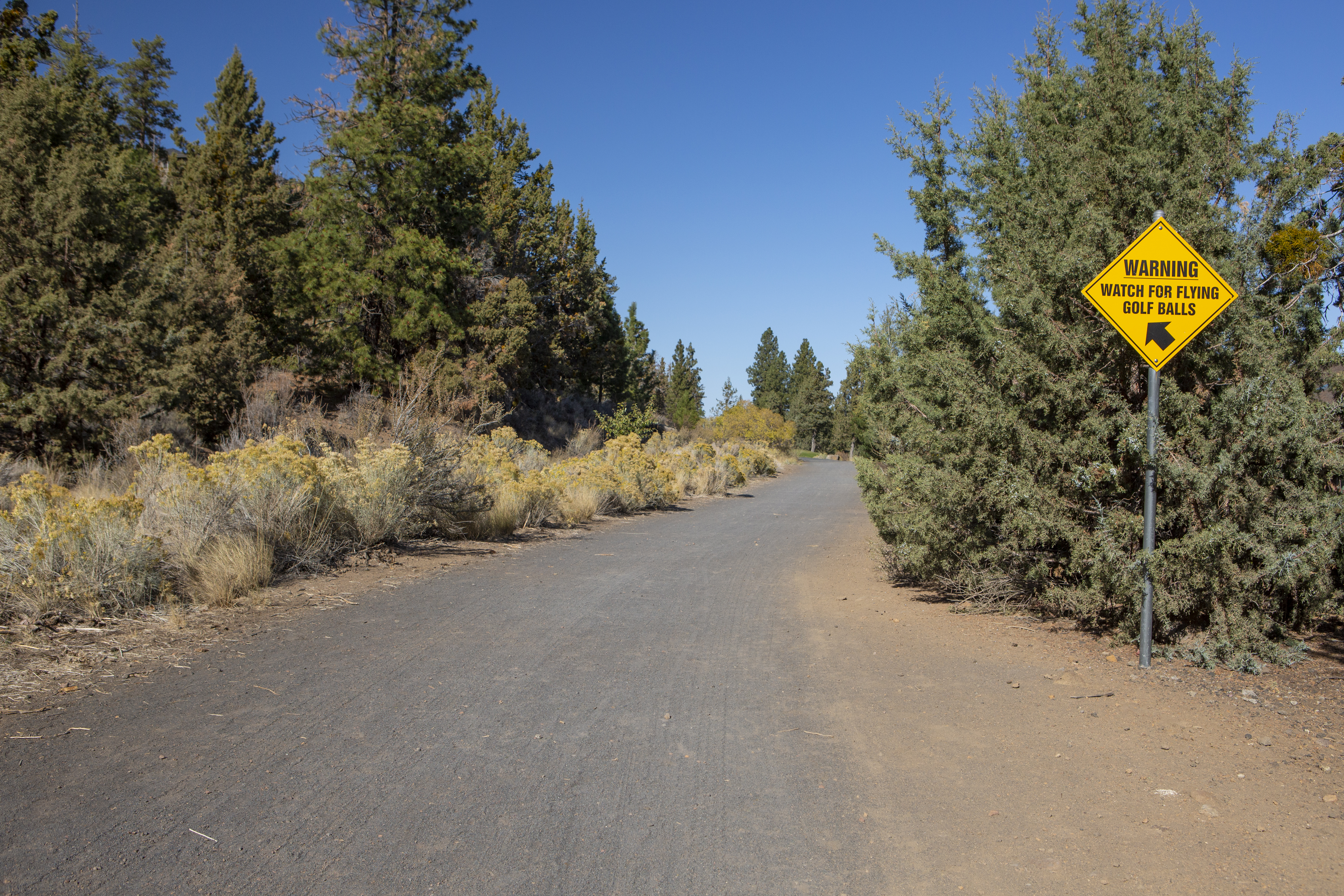 A warning sign on the DRT for golf balls