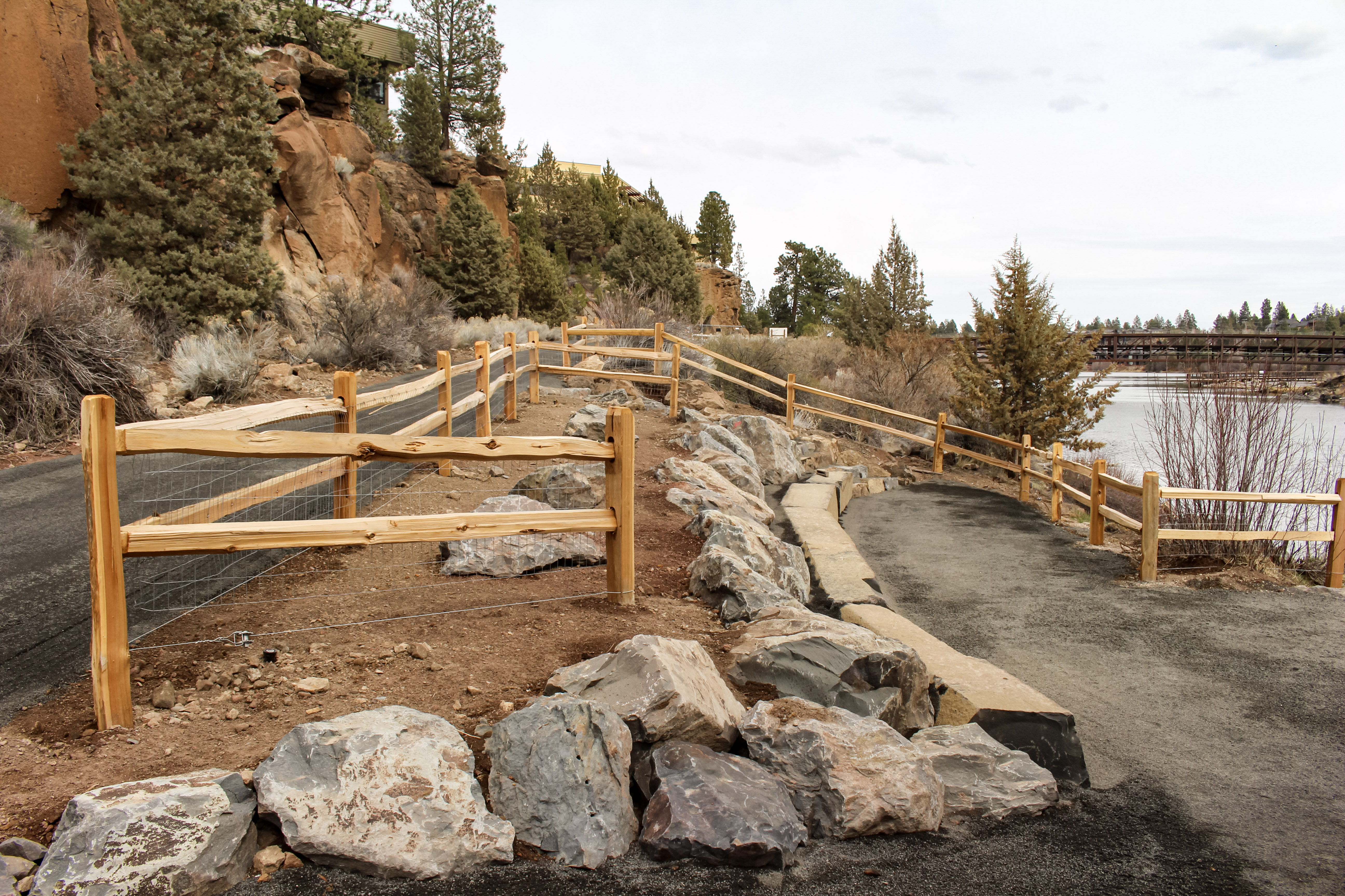 Photo of Riverbend South access 2 with fencing and boulders along river left
