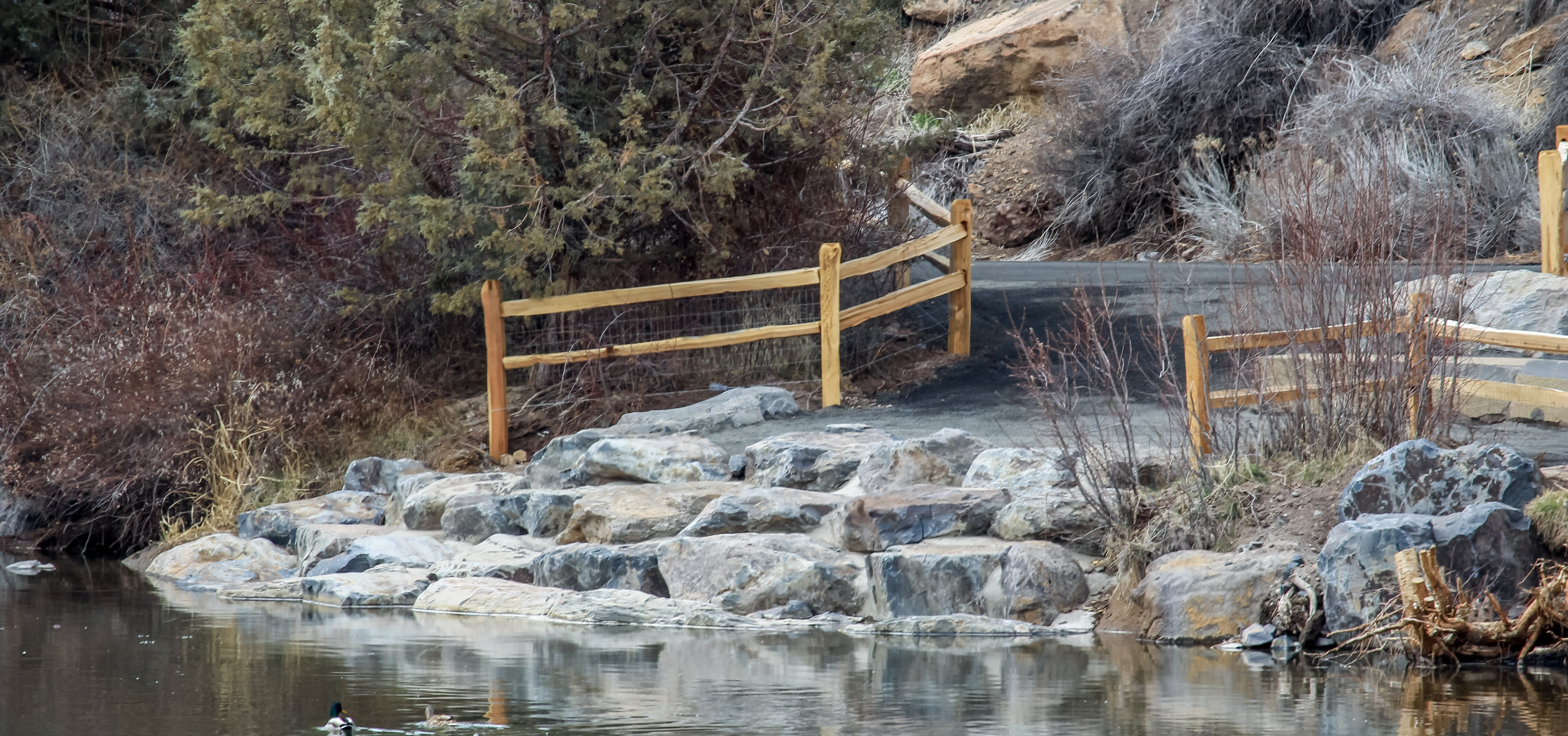 Riverbend South access improvement with boulder terrace and fencing along river left