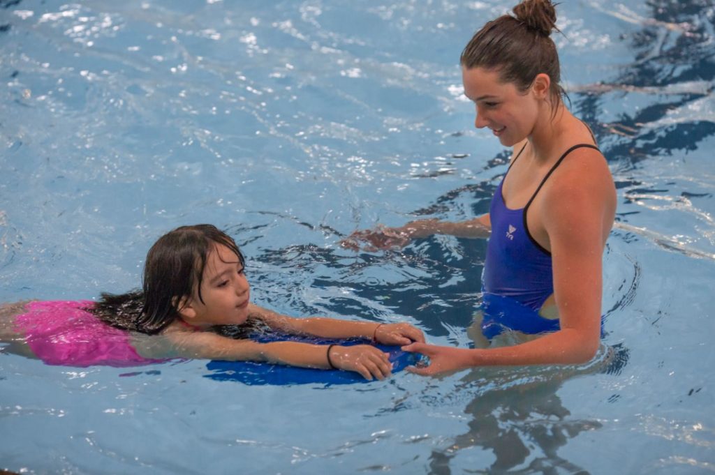 Image of a Youth Swim Coach at Juniper in Bend, Oregon.