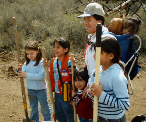 kids with shovels ready to plant trees at Shevlin Park