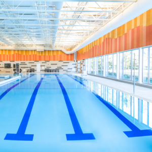 colorful image of an indoor swimming pool at Larkspur Community Center
