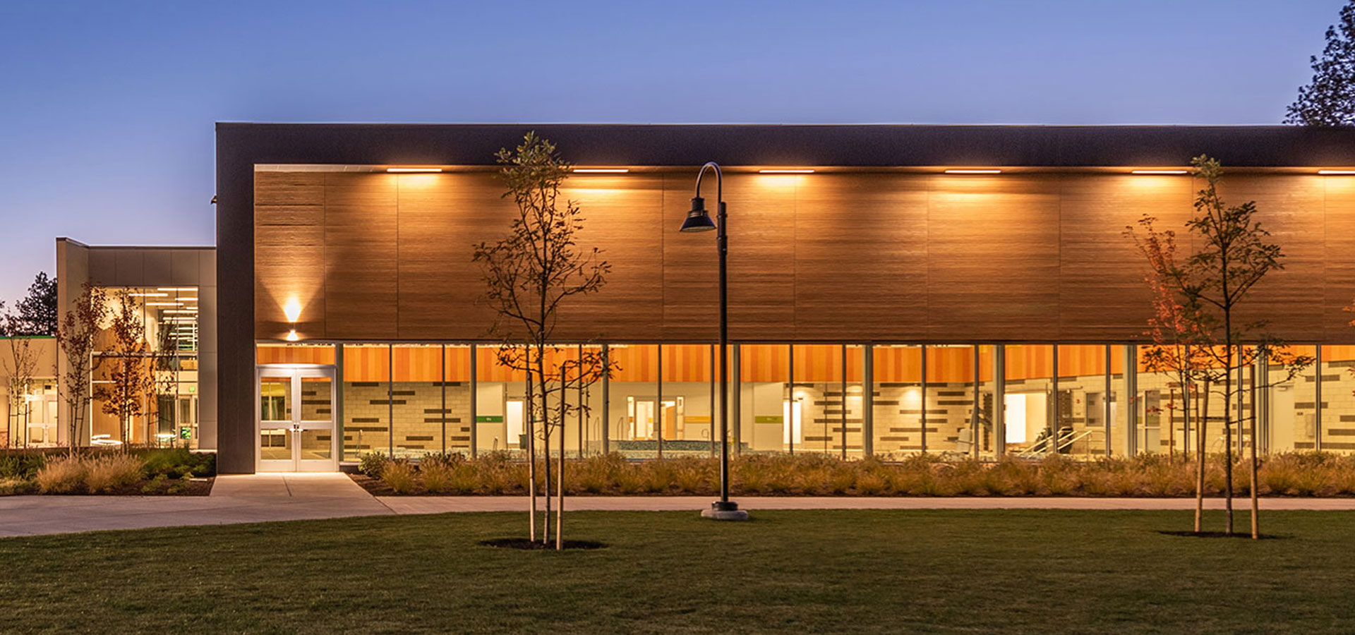 Photo of Larkspur facility at dusk.