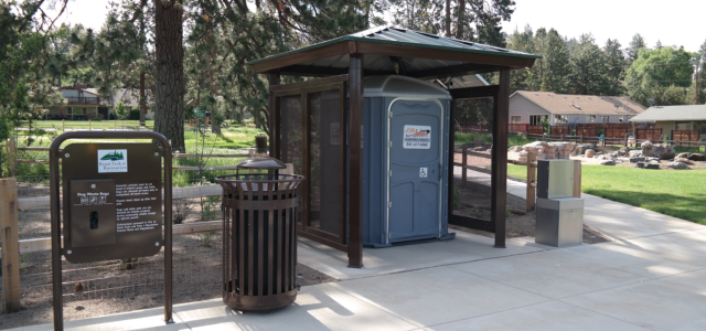 Goodrich Park entrance and covered, seasonal restrooms.