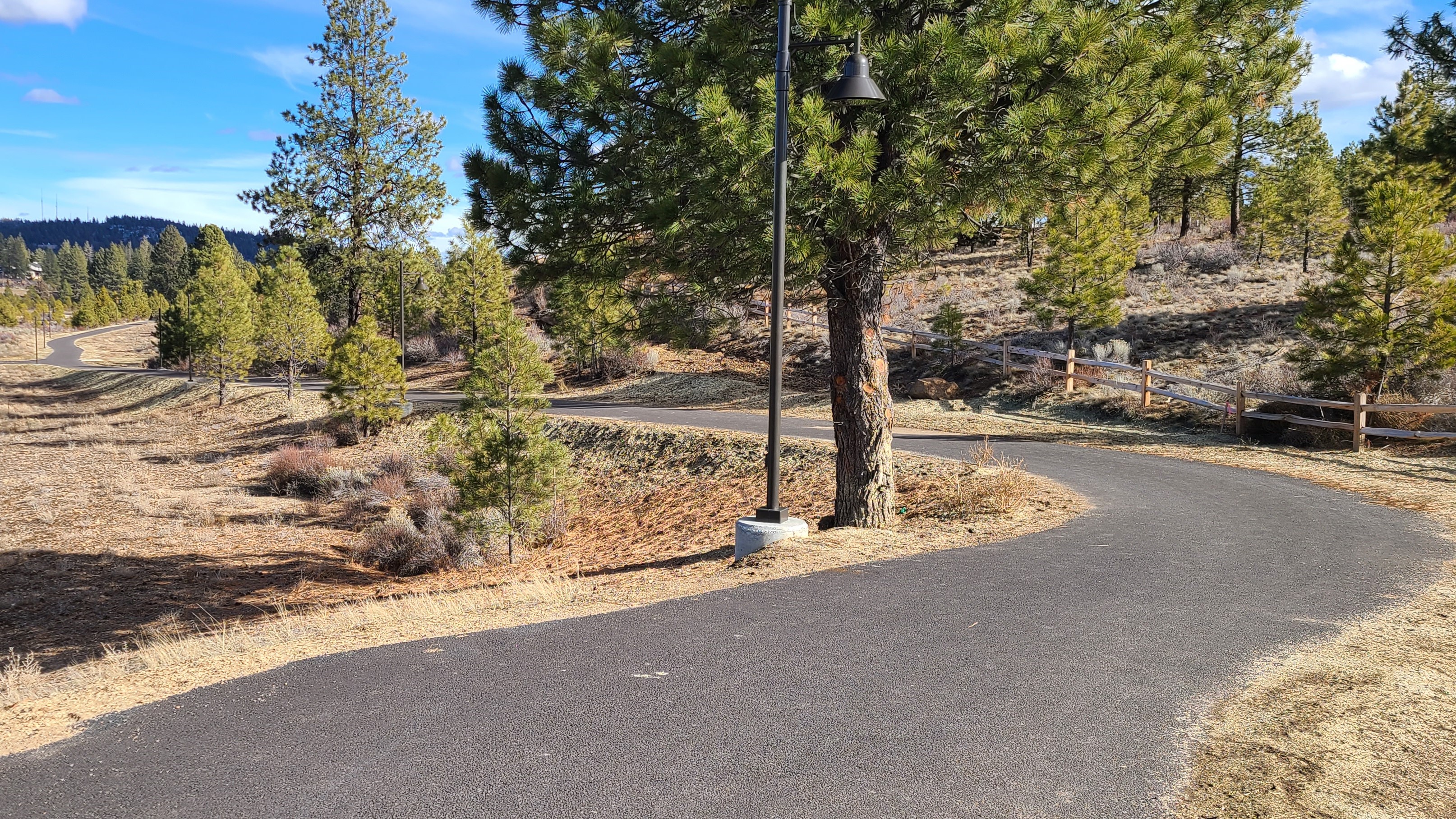 The paved Outback trail going through open space at Discovery West