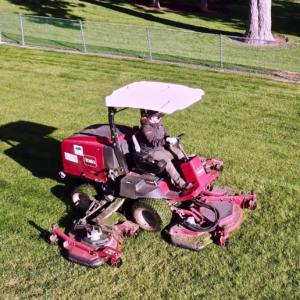 Image of a landscaping worker with Bend Park and Recreation District's park maintenance team. 