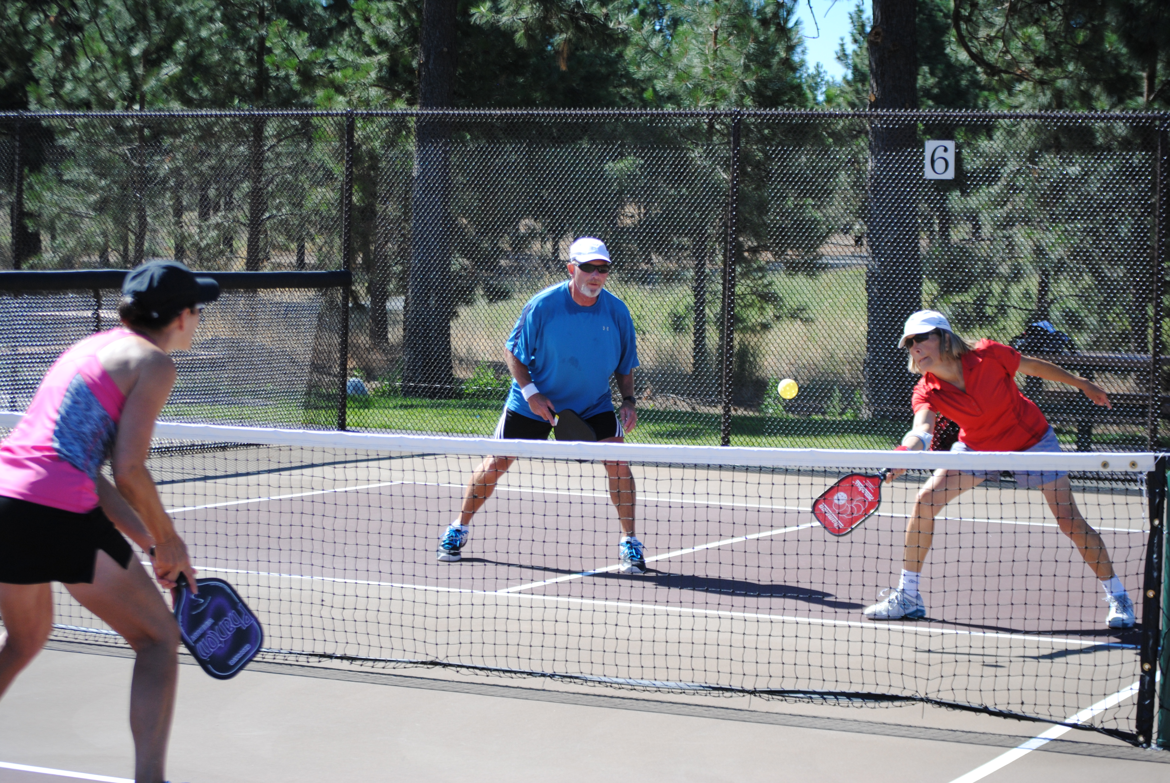 People playing pickleball at Pine Nursery