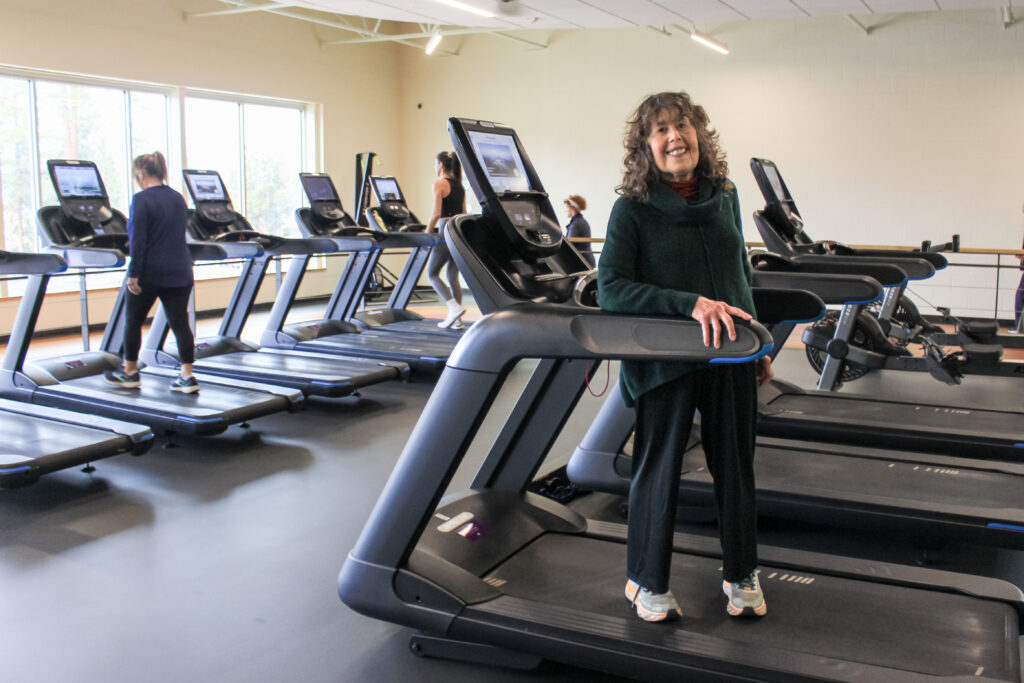 Ellen Anders on treadmill in Larkspur fitness center