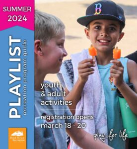 Summer 2024 Playlist cover with boy smiling while holding two popsicles