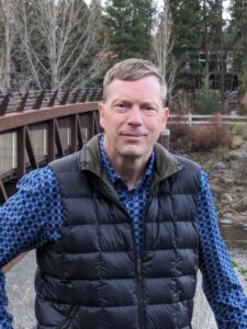 Cary Schneider at the footbridge at the Deschutes River