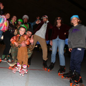 A group of roller dances poses for the camera during a dance session at the Pavilion.
